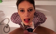 Short hair mature takes facial in the bathtub