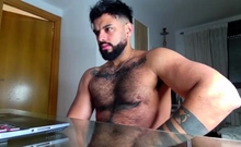 Gay latin stud jerks off his cock until he cums