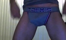 Uncut twink in jockstrap fucks dildo and cums