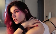 Busty redhead babe strips and masturbates