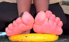 Brunette with foot fetish rubs big dick with her feet in POV
