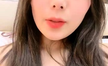 Amateur Asian teen sucks a big cock