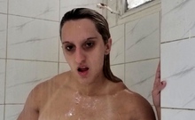 Skinny small titted blonde in shower