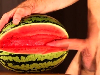 Muscular Stud Fucks and Cums on Watermelon
